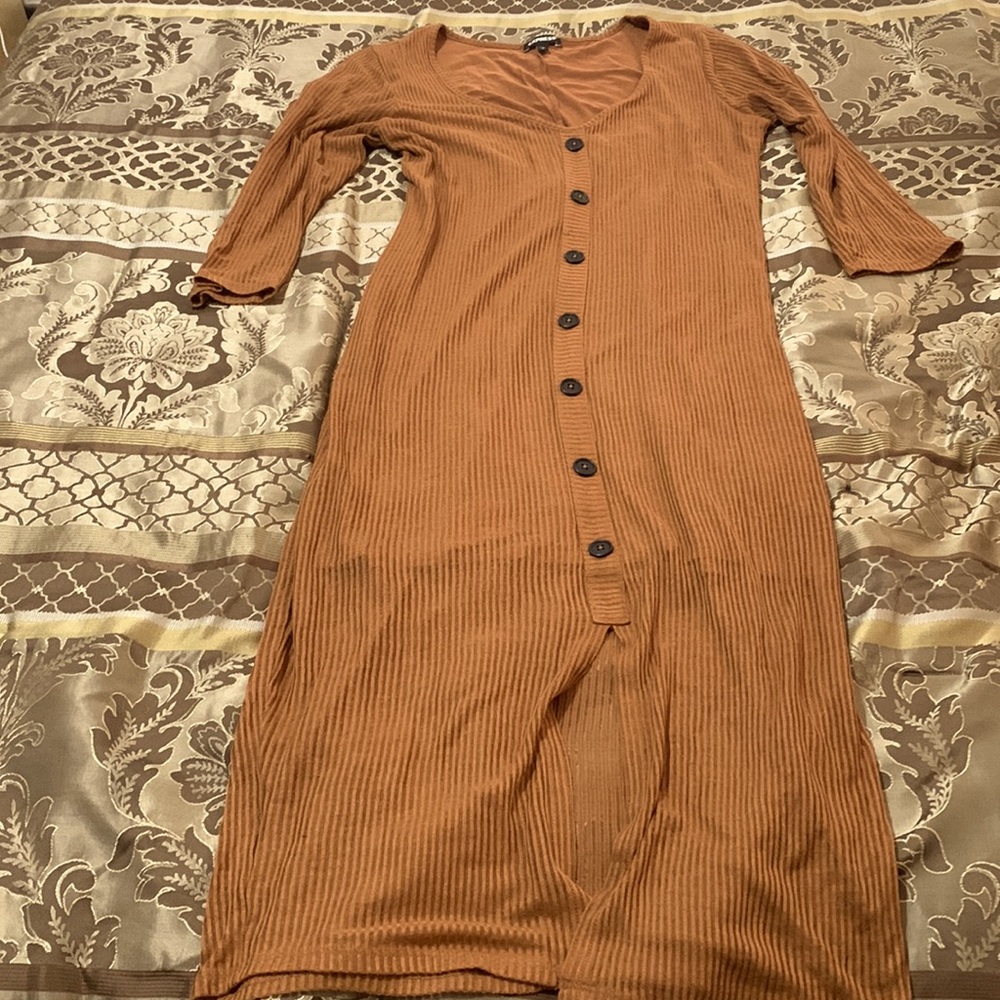 Express size large dress, 3/4 sleeve, lightweight with sheer bottom. MIDI length